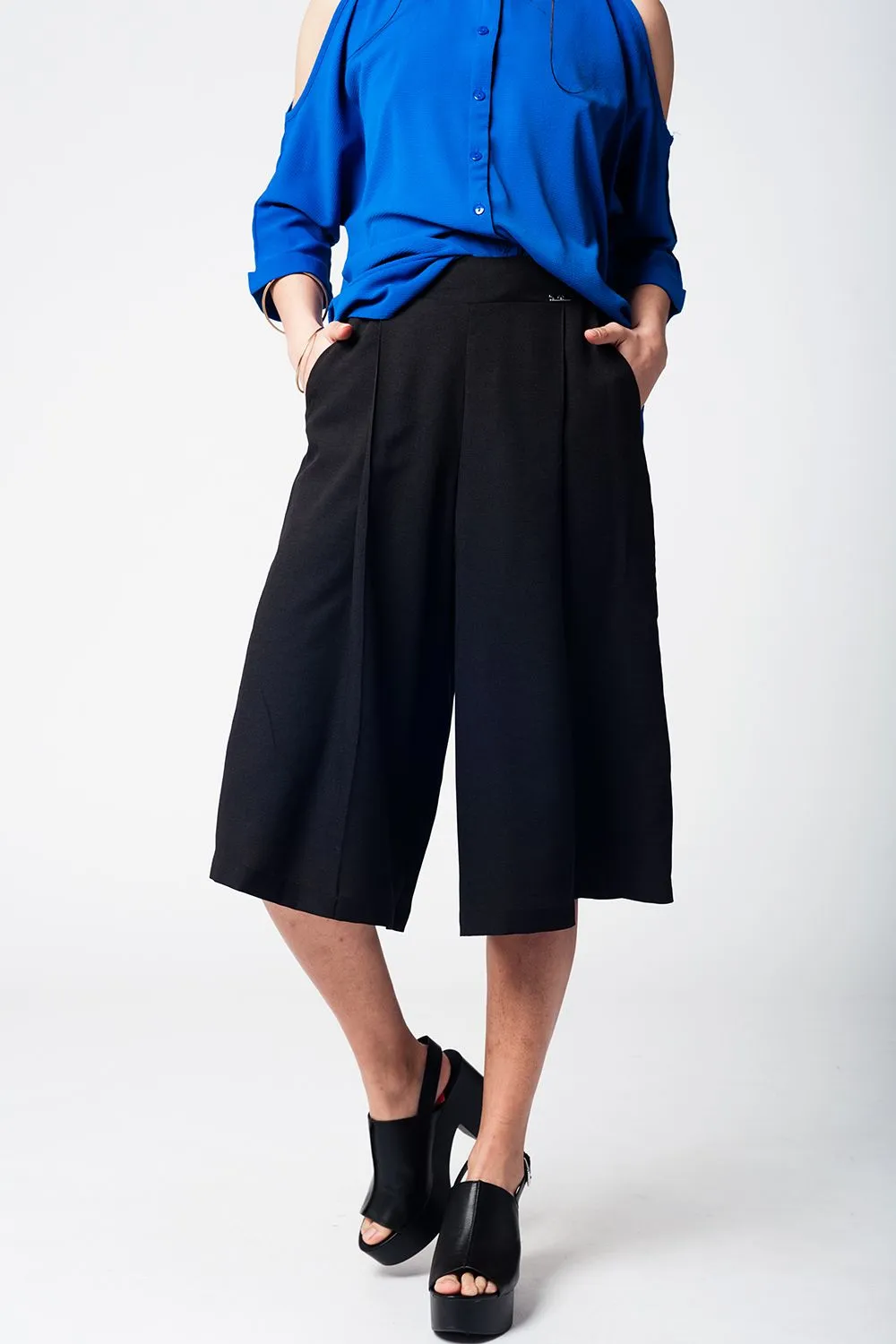 Black pants skirt with silver buttons