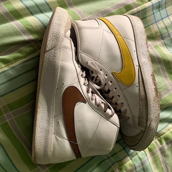 Nike blazers (yellow and brown swoosh)